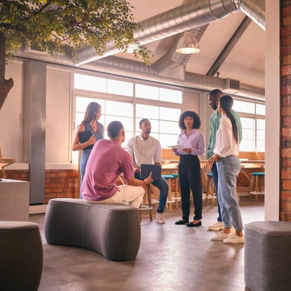 multi cultural business team having informal meeting